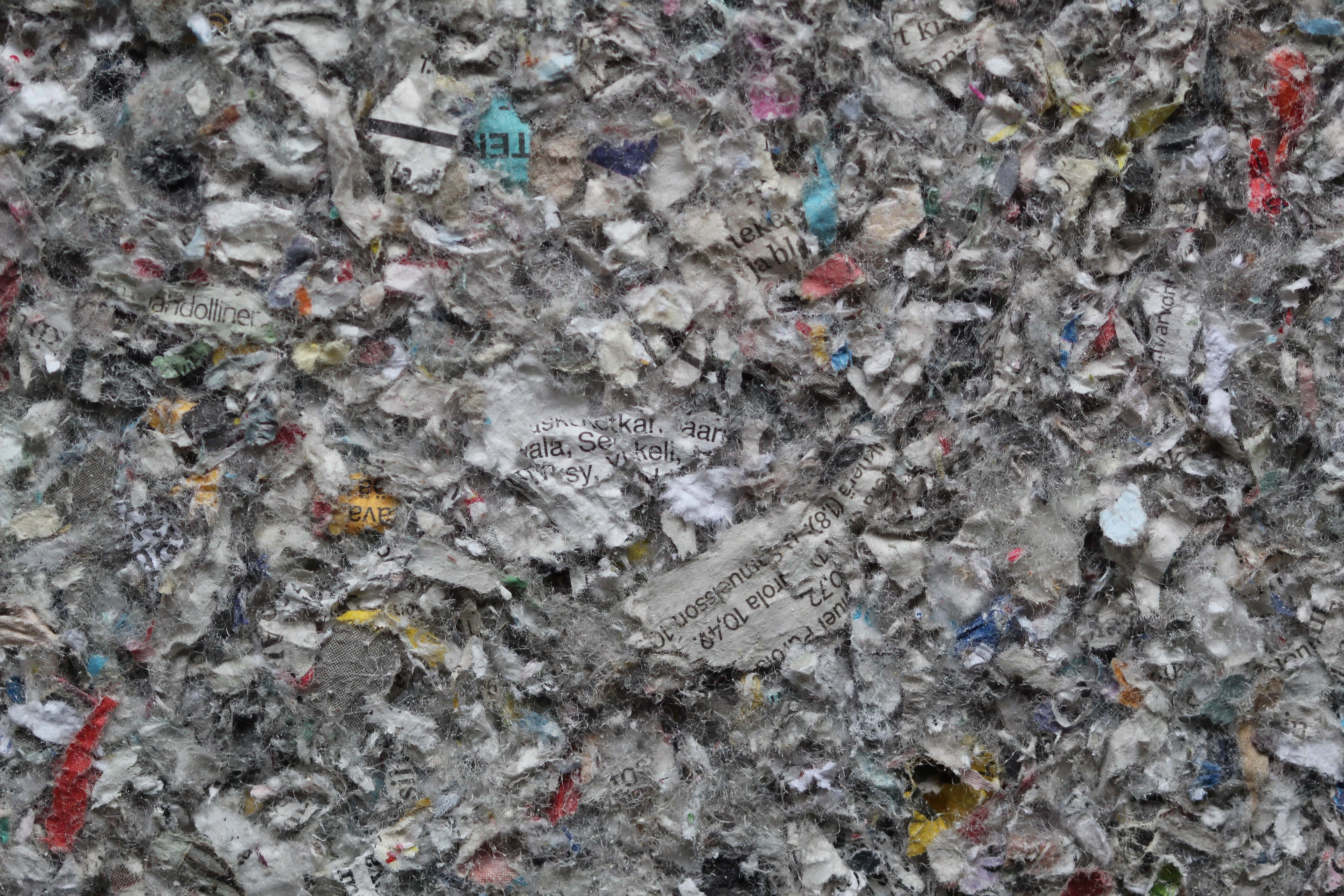 Cellulose insulation next to fiberglass insulation