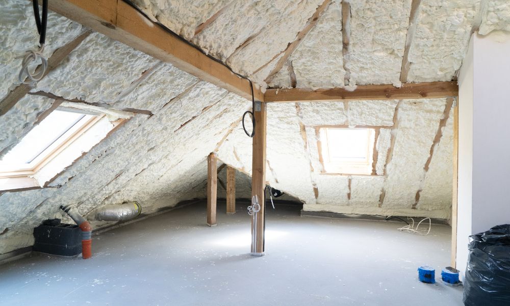 Spray foam and fiberglass insulation in an attic