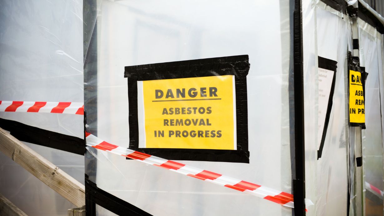 Close-up of asbestos insulation material found in an attic